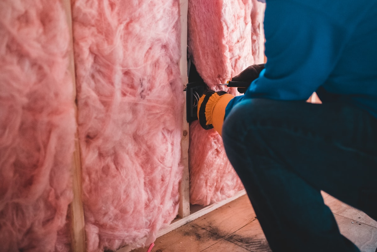 Home energy and insulation work that supports HVAC efficiency in a Dallas attic